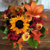 Sending this delightful basket of fresh fall flowers to someone who&#039;s on