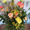 Traditional and classic carnations in a designers choice of Autumn colors. A
