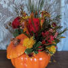 Say hello to fall with this traditional mix of autumn colored flowers