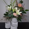 Spilling out and over with grace, these playful dahlias and snapdragons