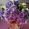 This special arrangement is made from the finest Dutch Bi-Colored Hydrangea, accented