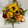 With fall among us, this basket of fall blooms is the perfect