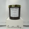 A mysterious soy wax 7oz candle.