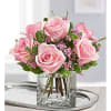 Light pink shade 12 roses with small wax flower in a square