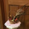 One of a kind creation of a pheasant hiding his head in