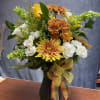 Embrace the beauty of fall with our exquisite fall arrangement!

Handcrafted with vibrant