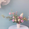 Elevate any occasion with our premium seasonal fresh blooms, artfully arranged with
