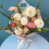 Elevate any occasion with our premium seasonal fresh blooms, artfully arranged with