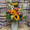 Spring mix of sunflowers, roses, hydrangea and snapdragons 