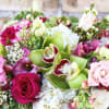 *DELUXE VERSION SHOWN*  Overflowing with blooms, this beautiful display of Holland