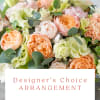 Have our talented staff choose the freshest blooms in stock and create