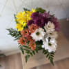 Bright, lively and full of charm, this arrangement features a fresh mix