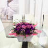 This bouquet is an enchanting composition that radiates both romance and sophistication.
