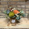 Flowers in a little bag. Bag color choices are: turquoise, natural (brown)