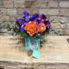 Flowers in a little bag. Bag color choices are: turquoise, natural (brown)