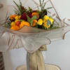 Transforming your space with a touch of fall magic, our exquisite bouquet/centerpiece