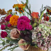 Transforming your space with a touch of fall magic, our exquisite bouquet/centerpiece