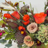 Transforming your space with a touch of fall magic, our exquisite bouquet/centerpiece