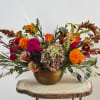 Transforming your space with a touch of fall magic, our exquisite bouquet/centerpiece