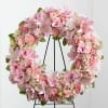 This gorgeous, premium wreath is carefully curated to include roses, lilies, gladiola