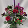 Our premium red Explorer roses, Alstroemaria and purple Moon Vista carnations with