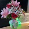 fresh flowers in clear vase 