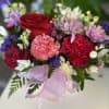 fresh flowers in purse setting 