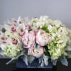 The name says it all. Modern and chic this arrangement stands approximately