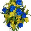 Celebrate with this Spectacular blue roses, alstroemerias, mini carnations, daisies, Ruscus, solidago