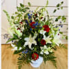 Red Roses and Carnations, White snapdragons or Gladiolus, Oriental Lilies, Chrysanthemums PompsBlue