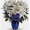Blue Hydrangea, White lilies, Cream Roses, Blue Delphinium, White Chrysanthemums and Greens