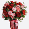 Red Roses, Red and Pink Carnations, Bupleurum, Greens. Red rose vase 8&rdquo;.