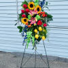 Bright colors Spray arrangement with: 
Hot pink and yellow roses, green snapdragons