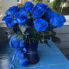 Blue roses in a blue vase with Small Blue Bear. 
Gathering or