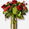 Red Roses, Carnations, Berries, Green Hydrangeas, Christmas Greens. Gold Vase. 