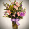 
Soft, romantic, and full of charm, this arrangement features delicate pink carnations