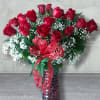 Timeless and romantic, this classic dozen of long-stemmed premium roses is the