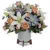 Sleek meets sweet! This modern arrangement pairs a sculptural succulent with soft