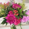 A bouquet of flowers in shades of pink full of love.
Made and