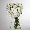 An all white tribute, this heart shaped easel shows your everlasting love.