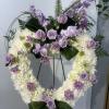 An all purple tribute, this heart shaped easel shows your everlasting love.