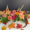 Celebrate the rustic charm of autumn with our Harvest Moon Centerpiece. This