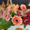 Celebrate the rustic charm of autumn with our Harvest Moon Centerpiece. This