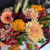 Celebrate the rustic charm of autumn with our Harvest Moon Centerpiece. This