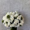 A breathtaking display of 75 pure white roses, accented with delicate white