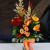 Warm and elegant, Autumn Embrace combines the beauty of deep red gerbera
