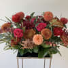 A beautiful seasonal table arrangement designed in a 10x5inch tray, with premium