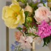 a sweet serenade of soft, sun-kissed hues! This arrangement is a gentle