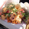 A medium-sized bouquet made with seasonal flowers that are available in our