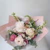 A medium-sized bouquet made with seasonal flowers that are available in our